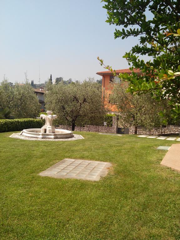 Апартаменти Casa Silvia Паденге-суль-Гарда Номер фото